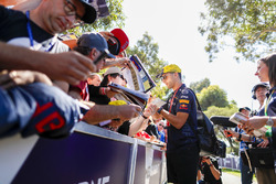 Daniel Ricciardo, Red Bull Racing, signs autographs for fans