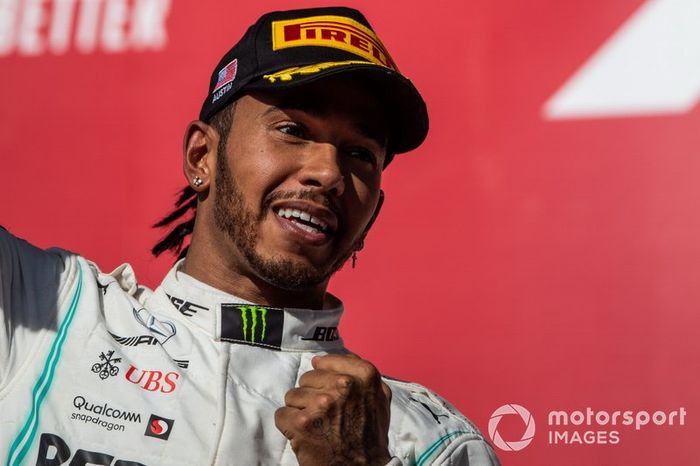 Lewis Hamilton, Mercedes AMG F1, 2nd position, celebrates on the podium after securing the drivers title