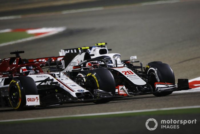 Nicholas Latifi, Williams FW43, battles Kevin Magnussen, Haas VF-20, Kimi Raikkonen, Alfa Romeo Racing C39 