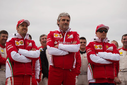 (L to R): Sebastian Vettel, Ferrari with Maurizio Arrivabene, Ferrari Team Principal and Kimi Raikkonen, Ferrari