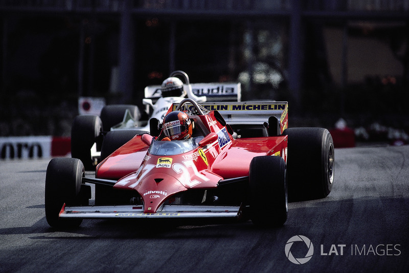 With 4 laps to go Gilles Villeneuve takes the lead from Alan Jones' Williams