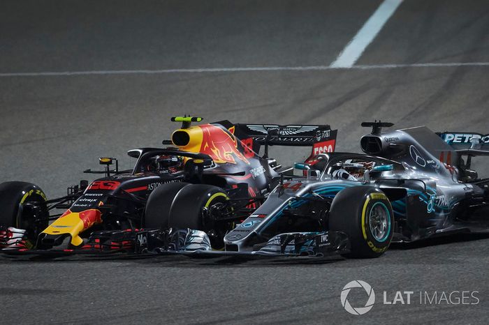 Lewis Hamilton, Mercedes AMG F1 W09, and Max Verstappen, Red Bull Racing RB14 Tag Heuer, make contact resulting in a puncture for the latter