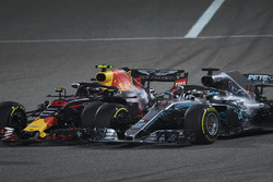 Lewis Hamilton, Mercedes AMG F1 W09, and Max Verstappen, Red Bull Racing RB14 Tag Heuer, make contact resulting in a puncture for the latter