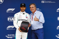 Lewis Hamilton, Mercedes AMG F1, celebrates pole position with Carlos Sainz