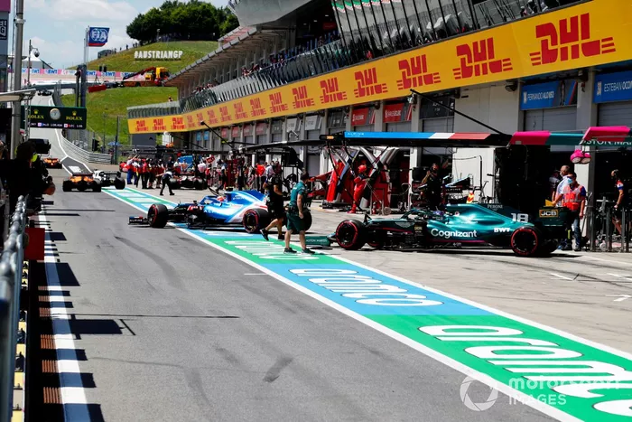 Esteban Ocon, Alpine A521, Lance Stroll, Aston Martin AMR21 
