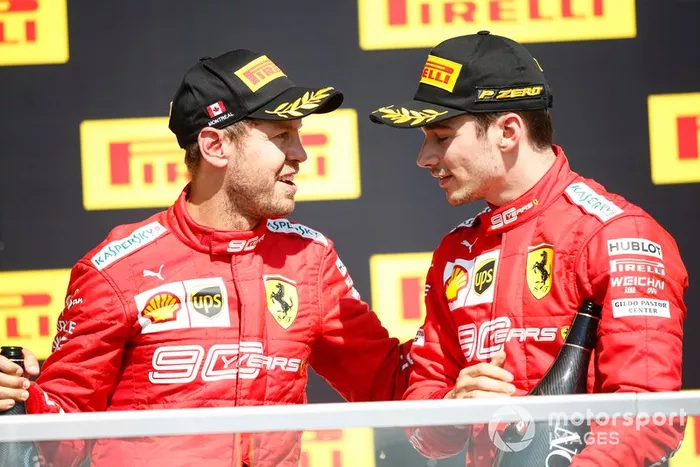 Sebastian Vettel, Ferrari, seconda posizione, e Charles Leclerc, Ferrari, terza posizione, sul podio