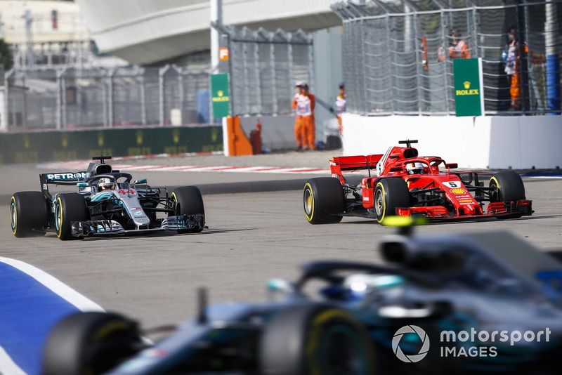 Sebastian Vettel, Ferrari SF71H, leads Lewis Hamilton, Mercedes AMG F1 W09