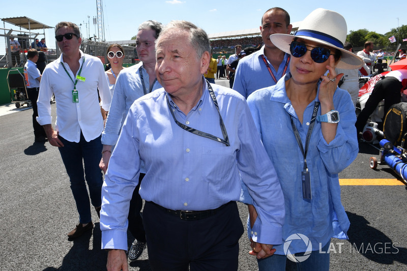 Jean Todt, FIA President and wife Michelle Yeoh, on the grid