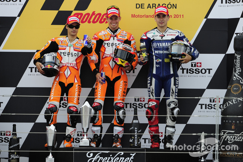 Podium: Race winner Casey Stoner, Respsol Honda; second place Dani Perdrosa, Repsol Honda; third place Jorge Lozenzo , Yamaha