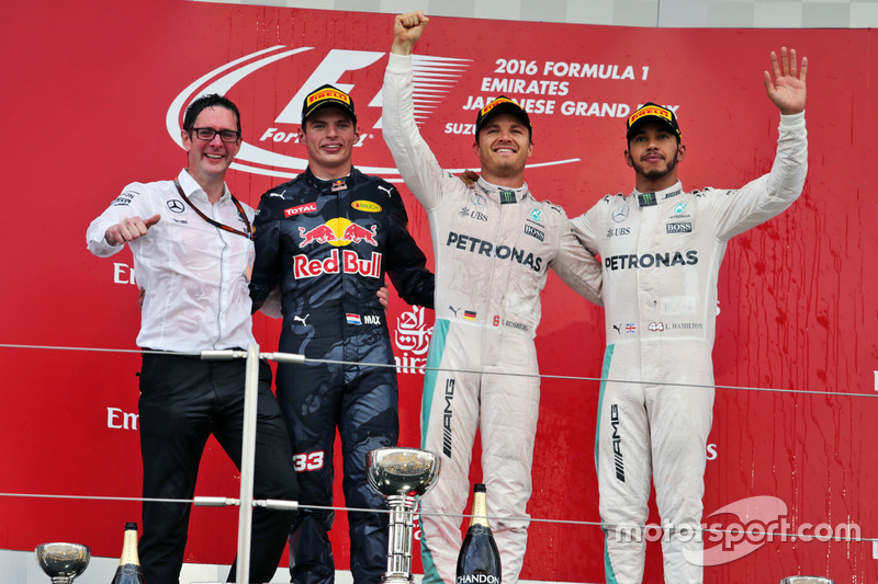 The podium (L to R): Andrew Shovlin, Mercedes AMG F1 Engineer; second place Max Verstappen, Red Bull