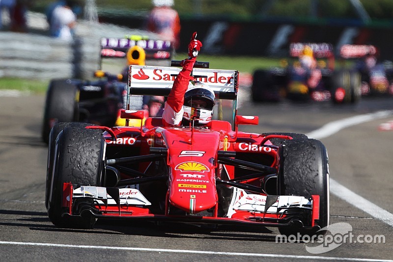 Race winner Sebastian Vettel, Ferrari SF15-T celebrates in parc ferme