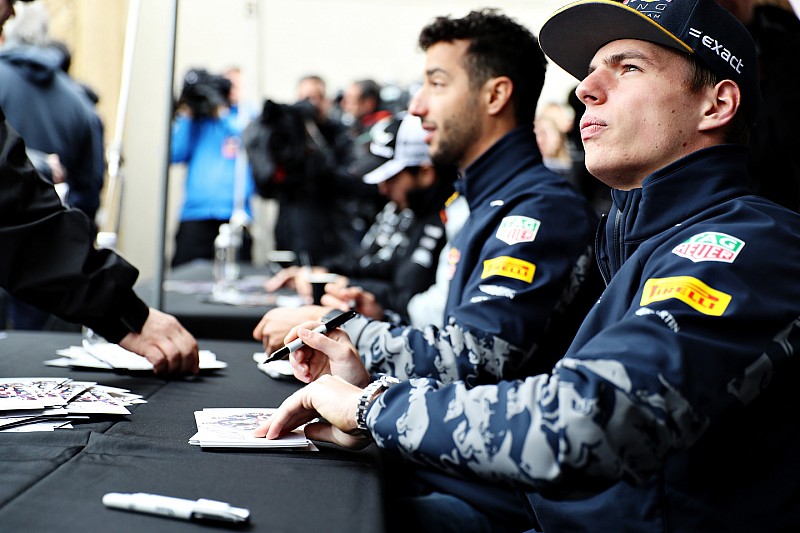 Max Verstappen, Red Bull Racing  and Daniel Ricciardo, Red Bull Racing sign autographs for fans