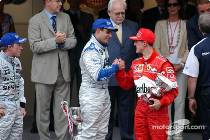 Podio:  ganador de la carrera Juan Pablo Montoya, Kimi Raikkonen y Michael Schumacher
