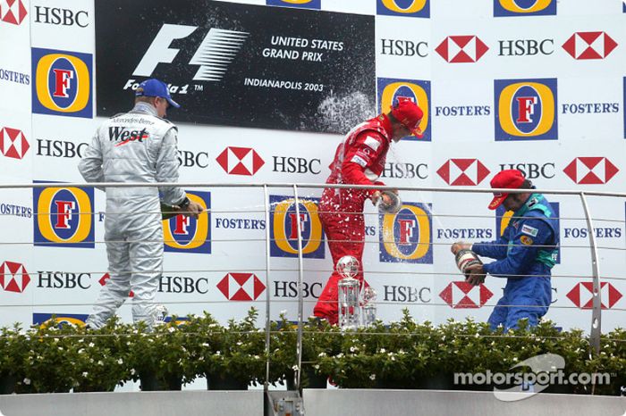 Podio: ganador de la carrera Michael Schumacher, segundo lugar Kimi Raikkonen y tercer lugar  Heinz-Harald Frentzen