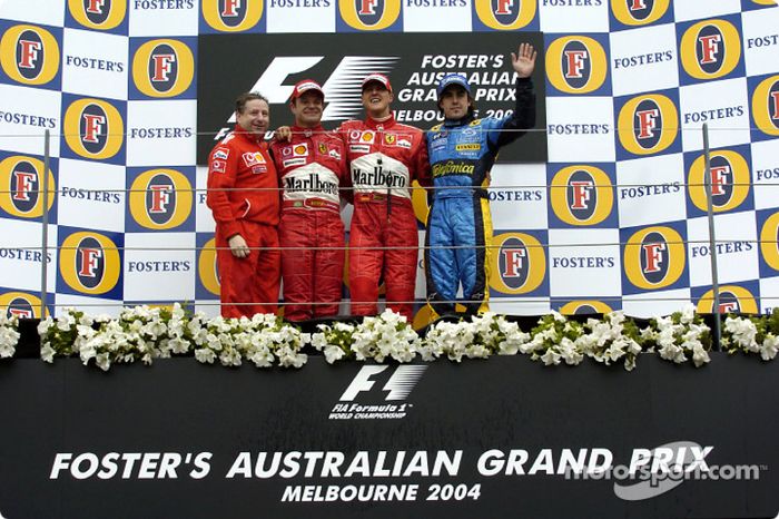 Podio: ganador de la carrera Michael Schumacher con Jean Todt, Rubens Barrichello y Fernando Alonso