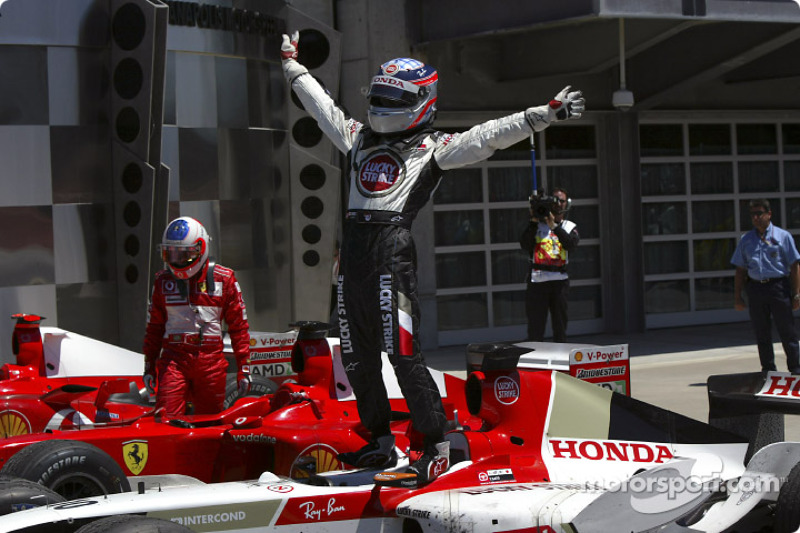 Takuma Sato celebrates third place finish