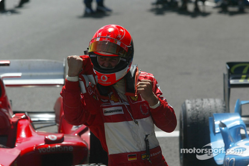 Race winner Michael Schumacher celebrates