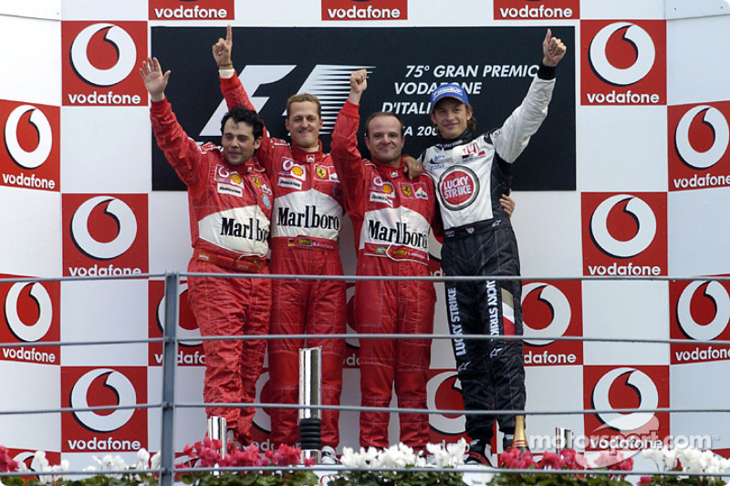 Podium: race winner Rubens Barrichello with Michael Schumacher, Jenson Button and Gabriele Delli Colli