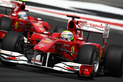 Felipe Massa, Scuderia Ferrari leads Fernando Alonso, Scuderia Ferrari