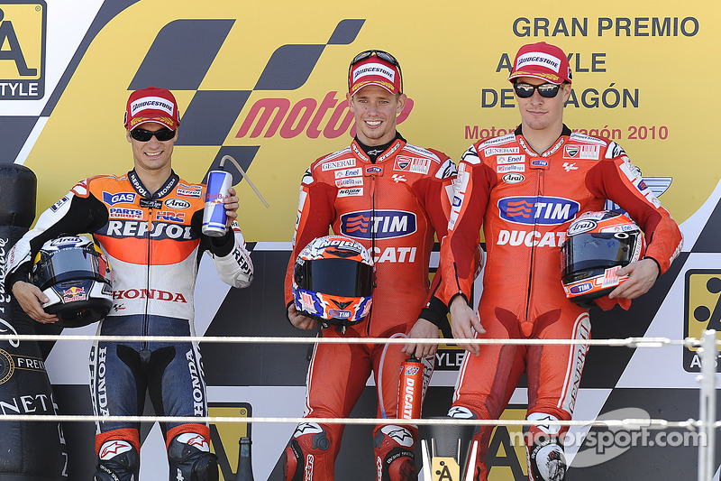 Podium: el ganador, Casey Stoner, Ducati Marlboro Team, segundo, Dani Pedrosa, Repsol Honda Team, te