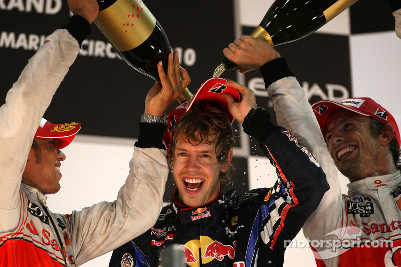 Podium: race winner and 2010 Formula One World Champion Sebastian Vettel, Red Bull Racing, second pl