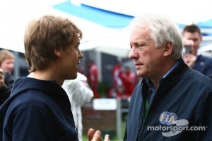 Sebastian Vettel, Red Bull Racing with Charlie Whiting, FIA Safety delegate, Race director & offical starter