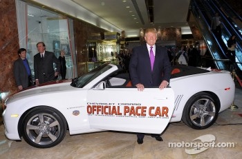 Donald Trump checks out his new ride as the 2011 Indianapolis 500 Chevrolet Camaro SS Convertible Pace Car driver for the 100th Anniversary of the Indianapolis 500