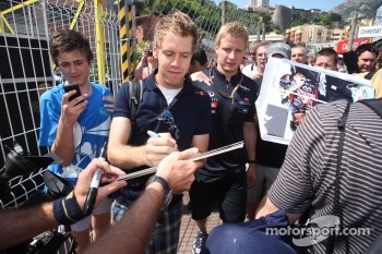 Sebastian Vettel, Red Bull Racing signing autographs for the fans
