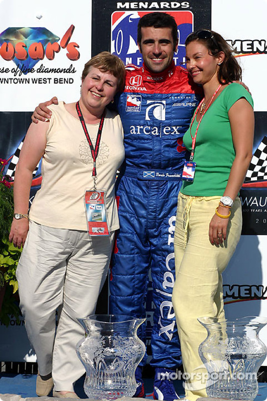 Victory lane race winner Dario Franchitti with wife Ashley at Vancouver