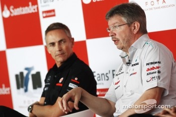 Martin Whitmarsh (McLaren) and Ross Brawn (Mercedes GP)