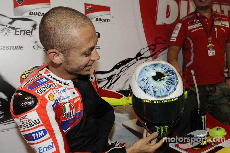 Valentino Rossi shows off his new helmet