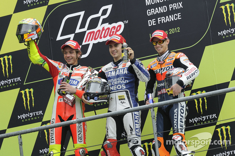 Podium: race winner Jorge Lorenzo, Yamaha Factory Racing, second place Valentino Rossi, Ducati Marlboro Team, third place Casey Stoner, Repsol Honda Team