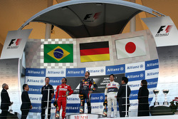 First place for Sebastian Vettel, Red Bull Racing second place for Felipe Massa, Scuderia Ferrari and third place for Kamui Kobayashi, Sauber F1 Team