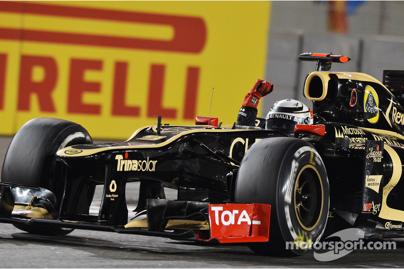 Race winner Kimi Raikkonen, Lotus F1 celebrates at the end of the race