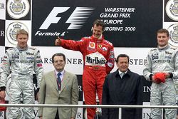 Podium: race winner Michael Schumacher, second place Mika Hakkinen, third place David Coulthard