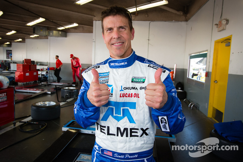 DP pole winner Scott Pruett celebrates