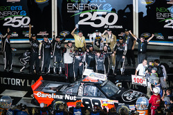 Victory lane: race winner Johnny Sauter celebrates
