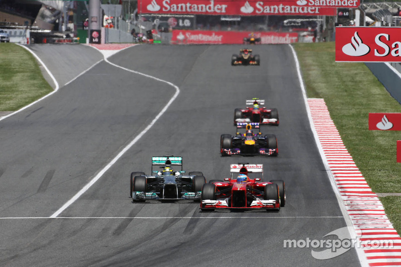 Фернандо Алонсо (Ferrari) й Ніко Росберг (Mercedes)