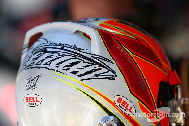 The helmet of Kimi Raikkonen, Lotus F1 Team on the grid as the race is stopped