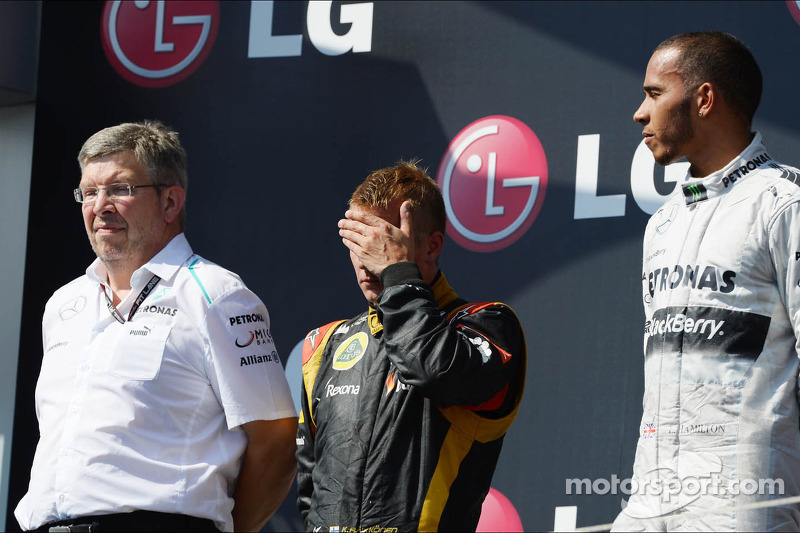 The podium, Ross Brawn, Mercedes AMG F1 Team Principal; Kimi Raikkonen, Lotus F1 Team, second; Lewis