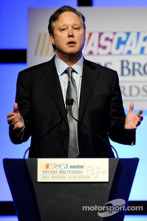 Brian France, chairman & CEO of NASCAR, speaks onstage at the NMPA Myers Brothers Awards Luncheon