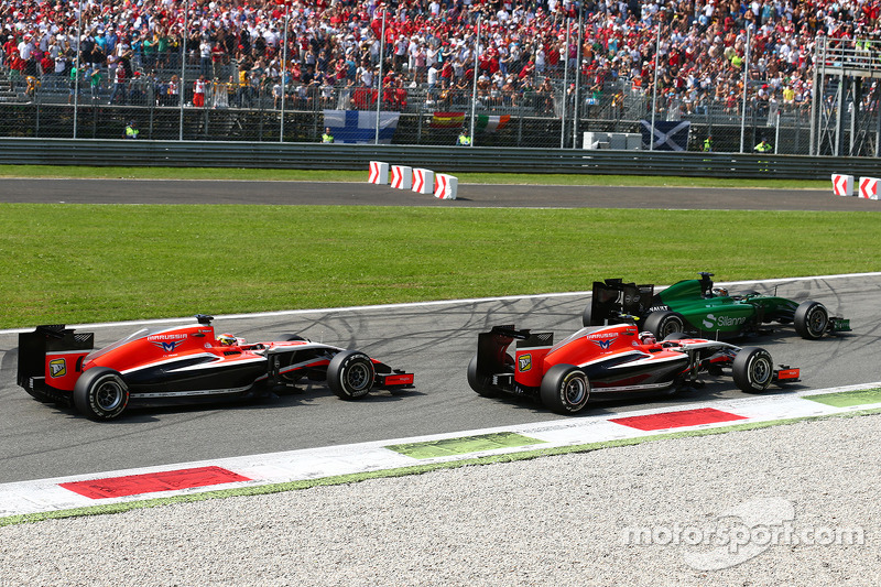 Kamui Kobayashi, Caterham CT05 leads Max Chilton, Marussia F1 Team MR03 and Jules Bianchi, Marussia F1 Team MR03 on the grid