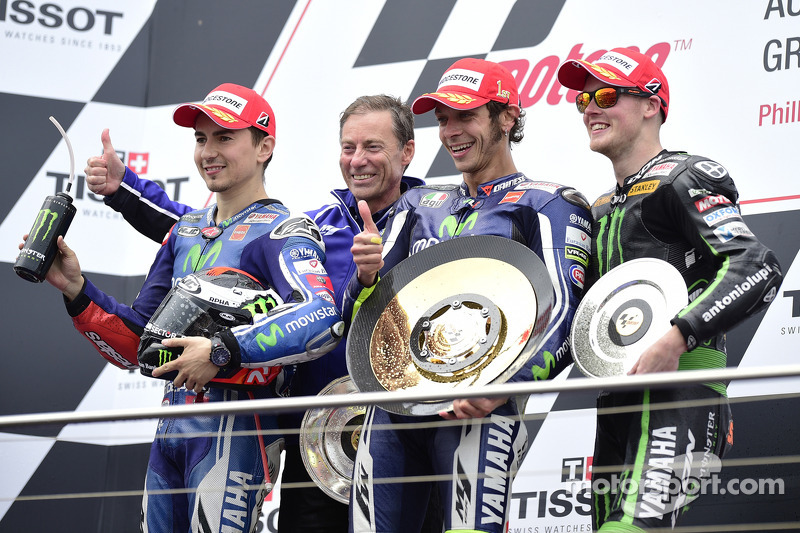 Podium 2014: Pemenang balapan, Valentino Rossi, Yamaha; Peringkat kedua, Jorge Lorenzo, Yamaha; Peringkat ketiga, Bradley Smith, Tech 3