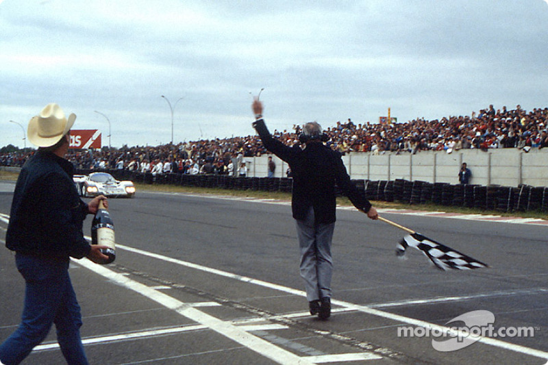 #1 Rothmans Porsche Porsche 962C: Hans-Joachim Stuck, Derek Bell, Al Holbert takes the checkered flag