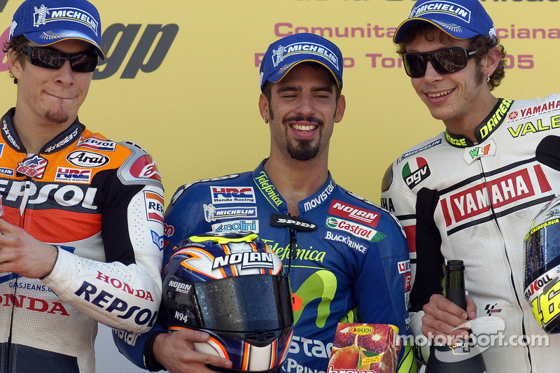 Podium: race winner Marco Melandri with Nicky Hayden and Valentino Rossi