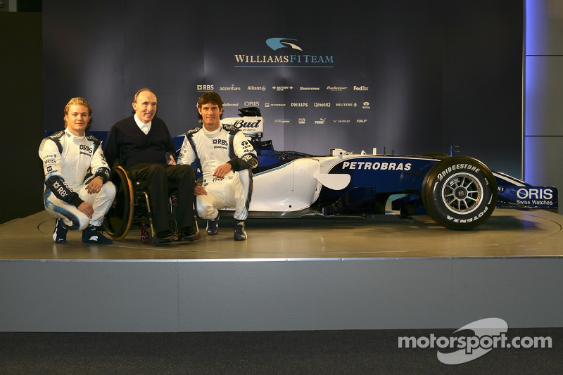 Nico Rosberg, Frank Williams and Mark Webber with the new Williams FW28