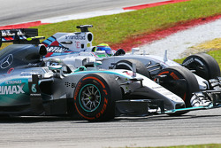 Nico Rosberg, Mercedes AMG F1 W06 and Felipe Massa, Williams FW37 battle for position