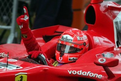 Race winner Michael Schumacher celebrates