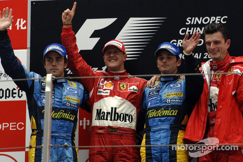 Podium: race winner Michael Schumacher with Fernando Alonso and Giancarlo Fisichella