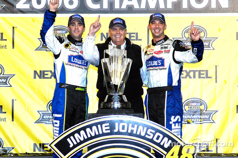 Championship victory lane: 2006 NASCAR Nextel Cup champion Jimmie Johnson celebrates with Rick Hendr